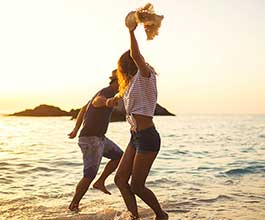 Couple dancing on beach