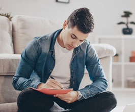 Man writing on paper