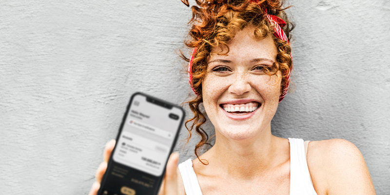 Lady holding up phone