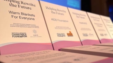 Helping rewrite the future sign with different campaign foundations displayed 