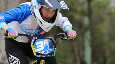 Kid riding a dirt bike 