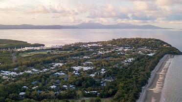 View of beach houses and mountains