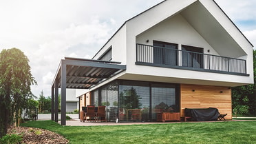 A nice two storey home taken from the backyard