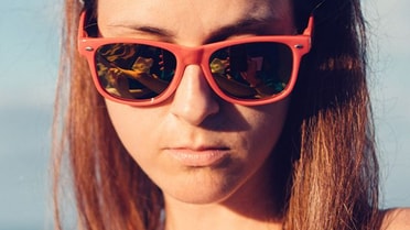 woman in red sunglasses