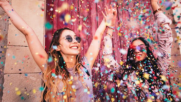 Pair celebrating with confetti