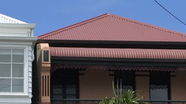 upwards shot of two homes