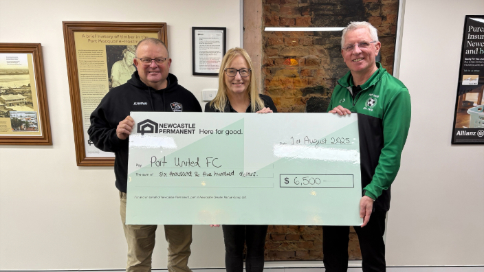 Port United FC flood relief- members receiving cheque