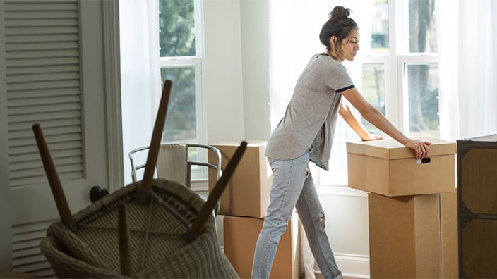 Woman with moving boxes