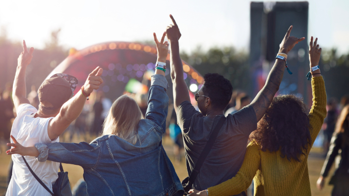 4 friends at a festival