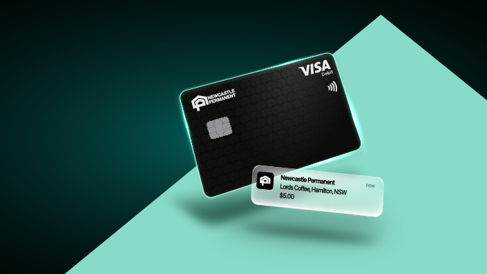 Newcastle Permanent Visa Debit card and digital wallet notification reading "Newcastle Permanent, Lords Coffee Hamilton, NSW, $5.00" floating on dark green background